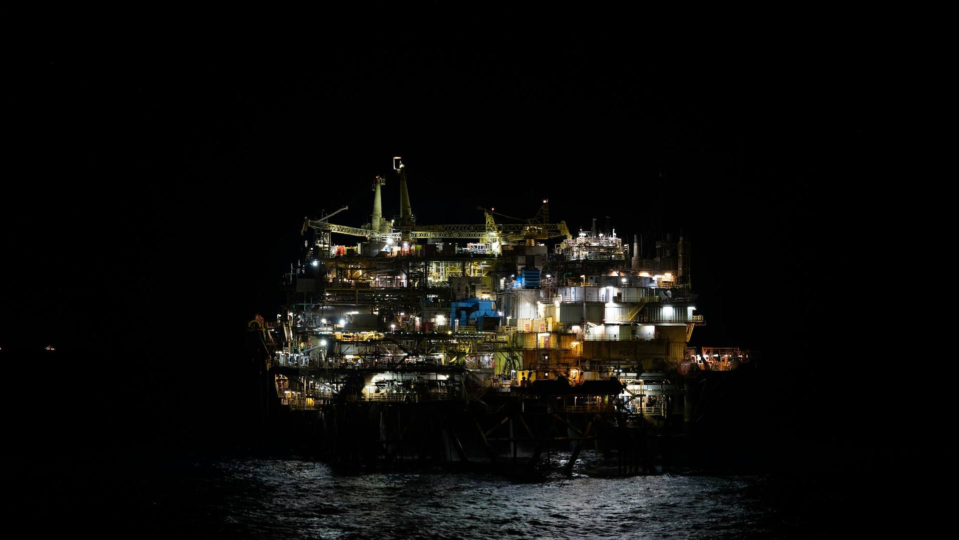 Offshore platform lit at night