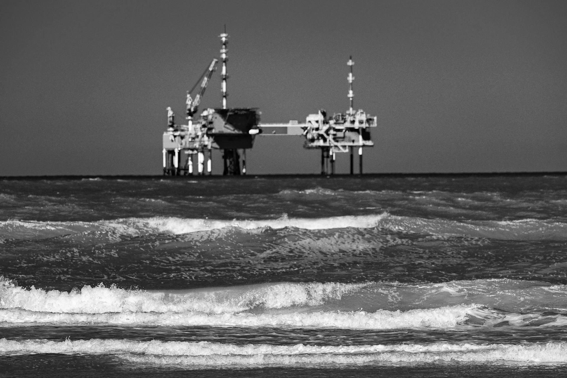 Offshore platforms seen across rough sea