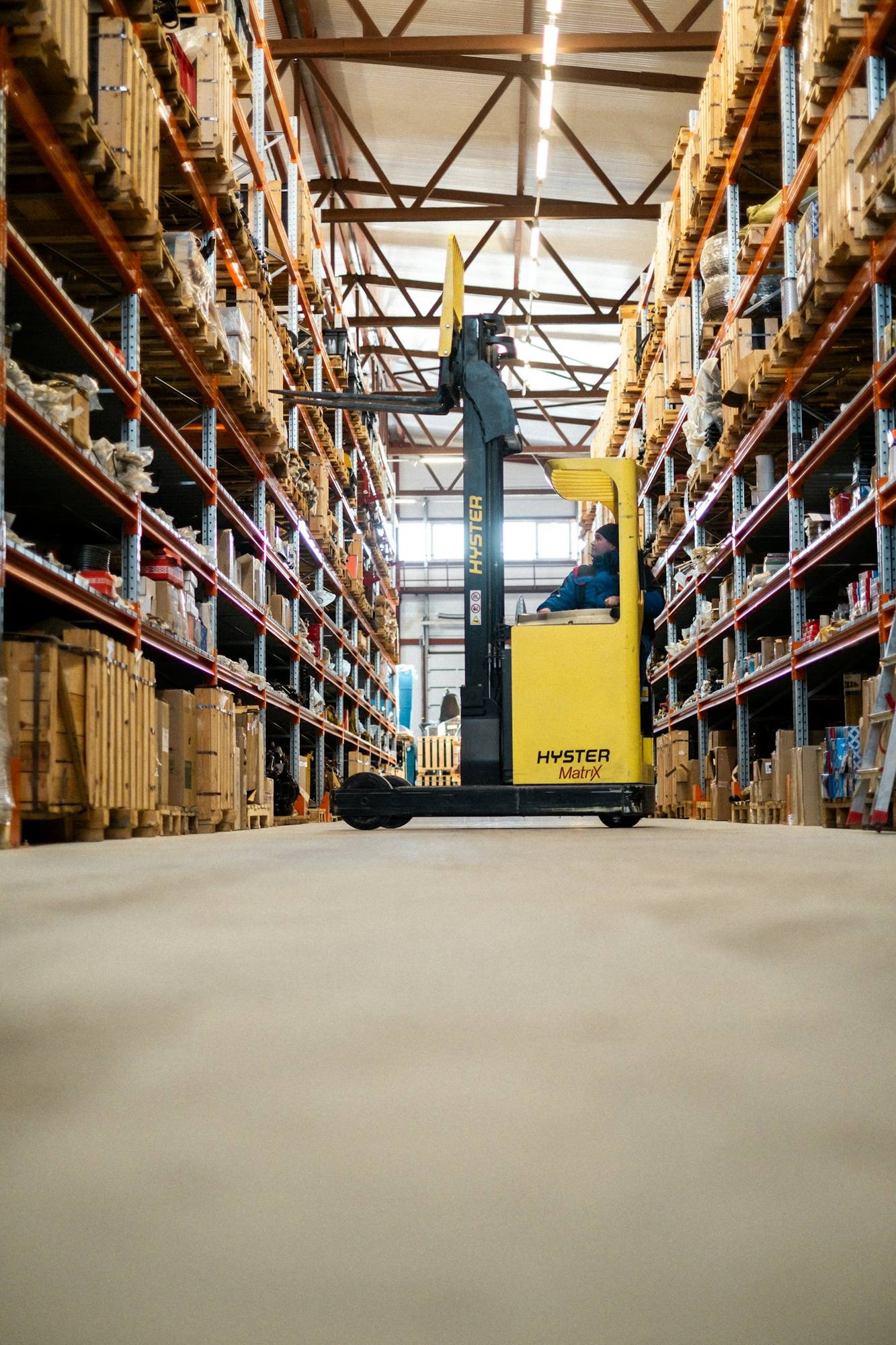 Warehouse with racking and forklift